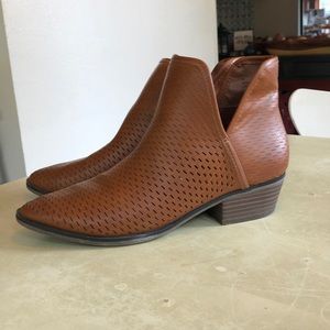 Perforated ankle boots